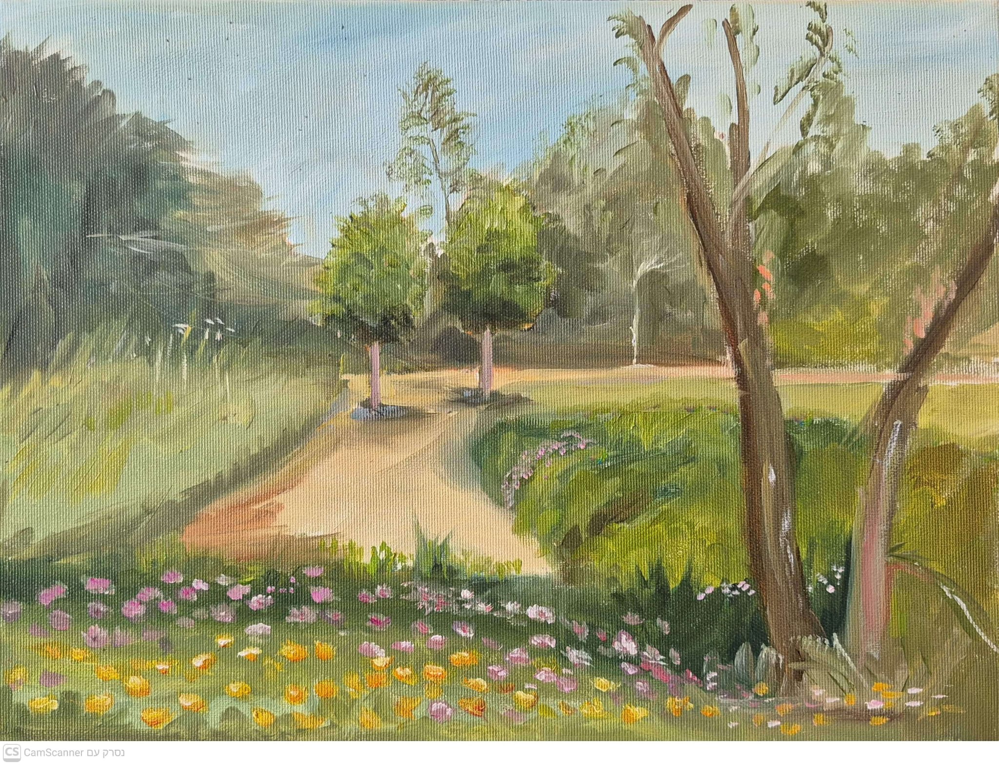 שביל גן בין עצים ופרחים